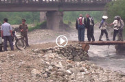 Foreigners ride motorcycles in North Korea.