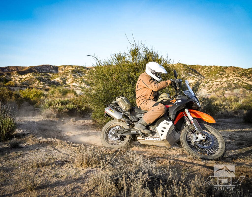 Riding a turn track on an adventure bike